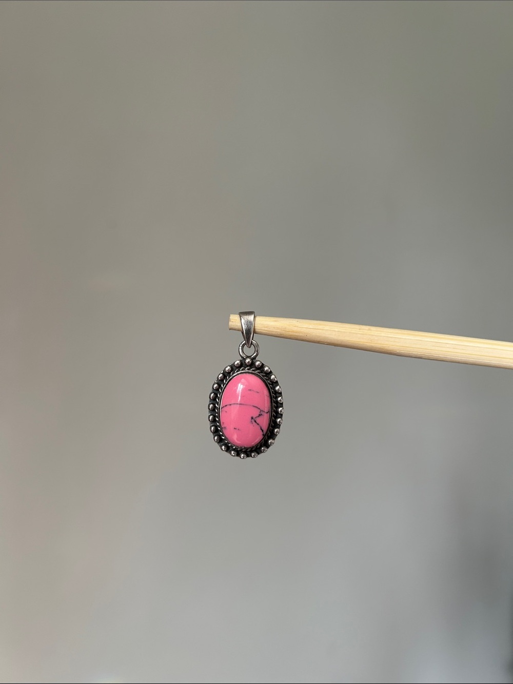 Pink oval sterling silver howlite pendant